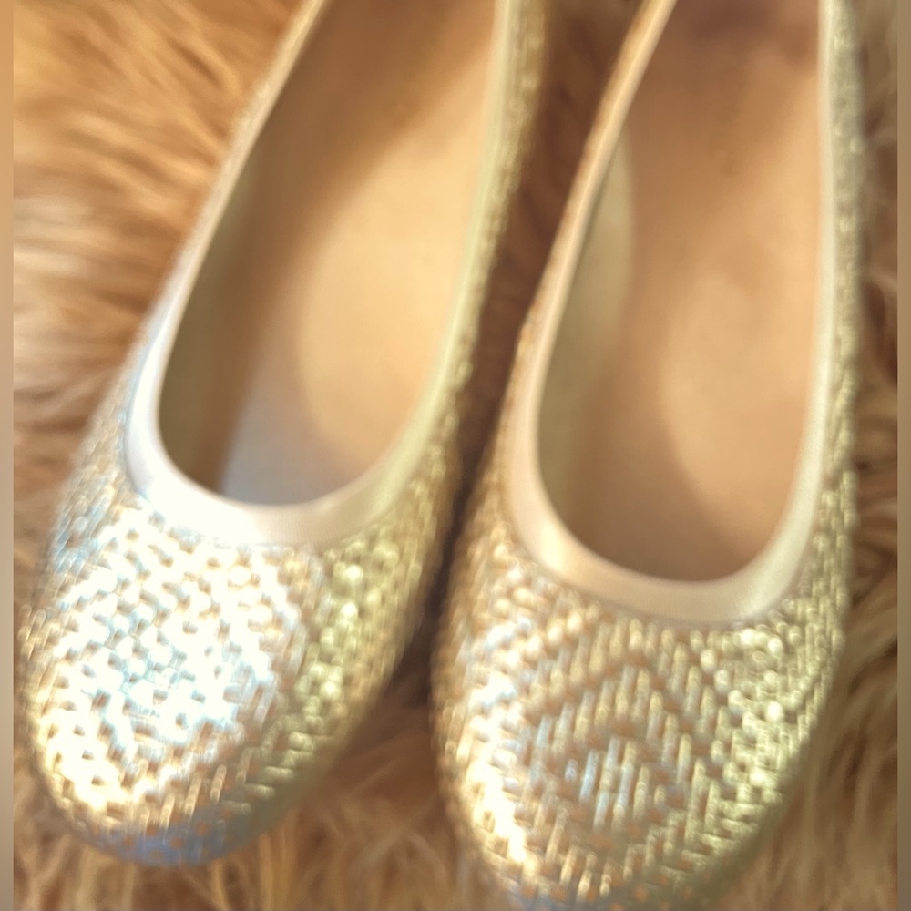 Woven gold flats.